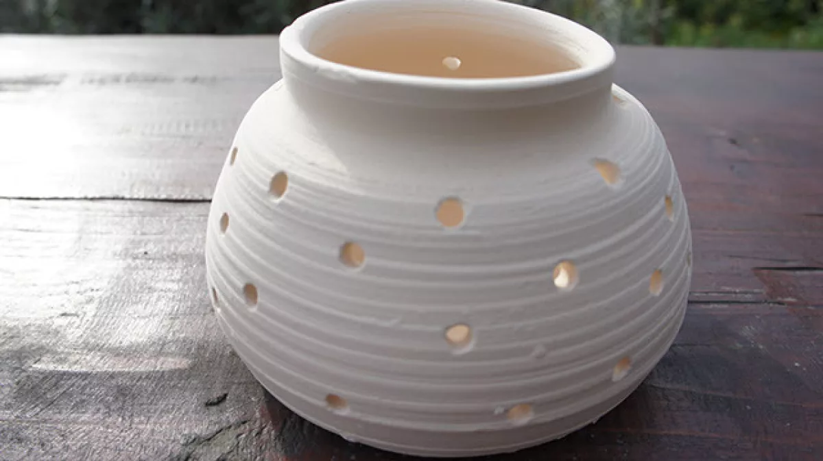 White candle pot, close up