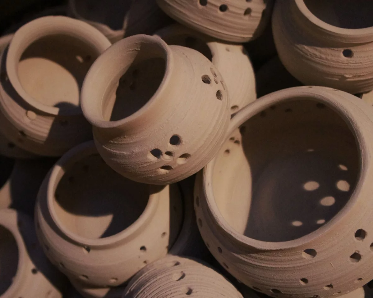 Unglazed candle pots
